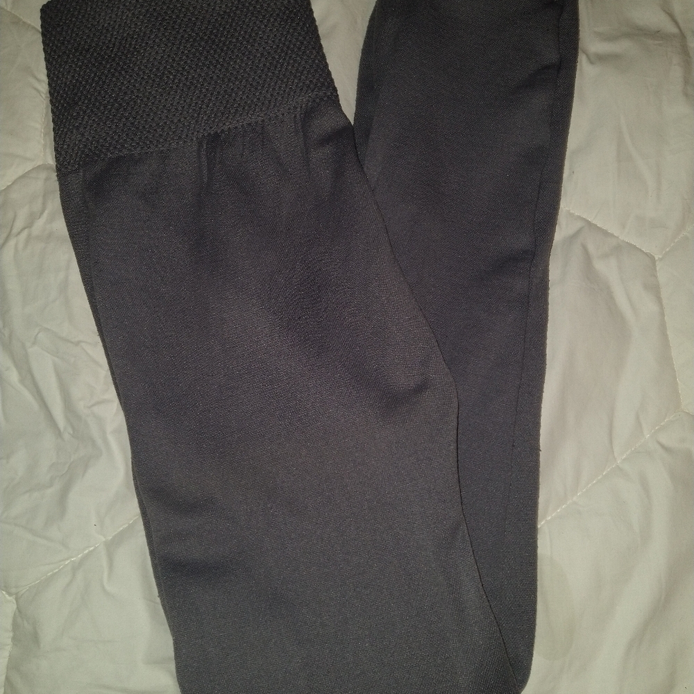 I am selling a pair of Gray high-waisted leggings one size in Women's!